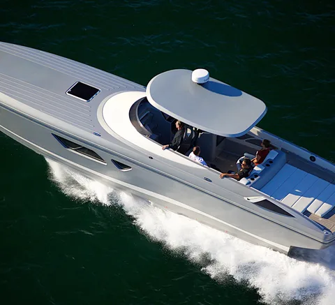 Sport boat running at speed, seen from above the aft quarter