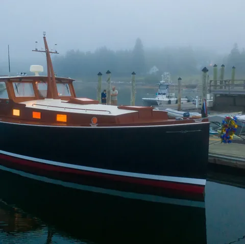 Classic motor yacht moored at dawn